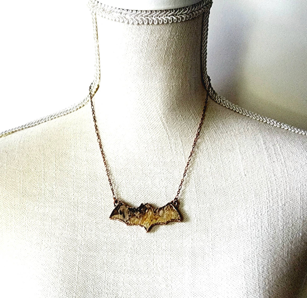 Fossilized Palm Root Bat Necklace